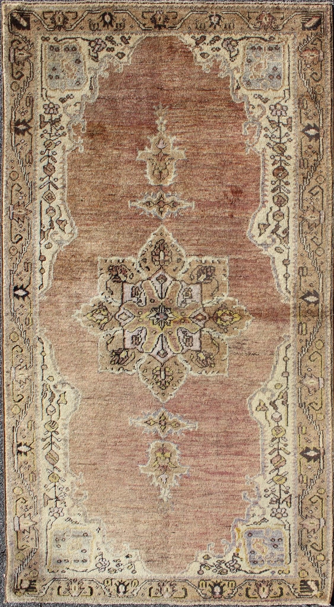 This vintage Turkish Oushak rug features an intricately beautiful design with a stylized floral aesthetic. The central medallion is surrounded by four cornices in the central field. The various shades of cream, yellow, charcoal, and gray blend beautifu... - Keivan Woven ArtsEN - 140587 - 6374Rug