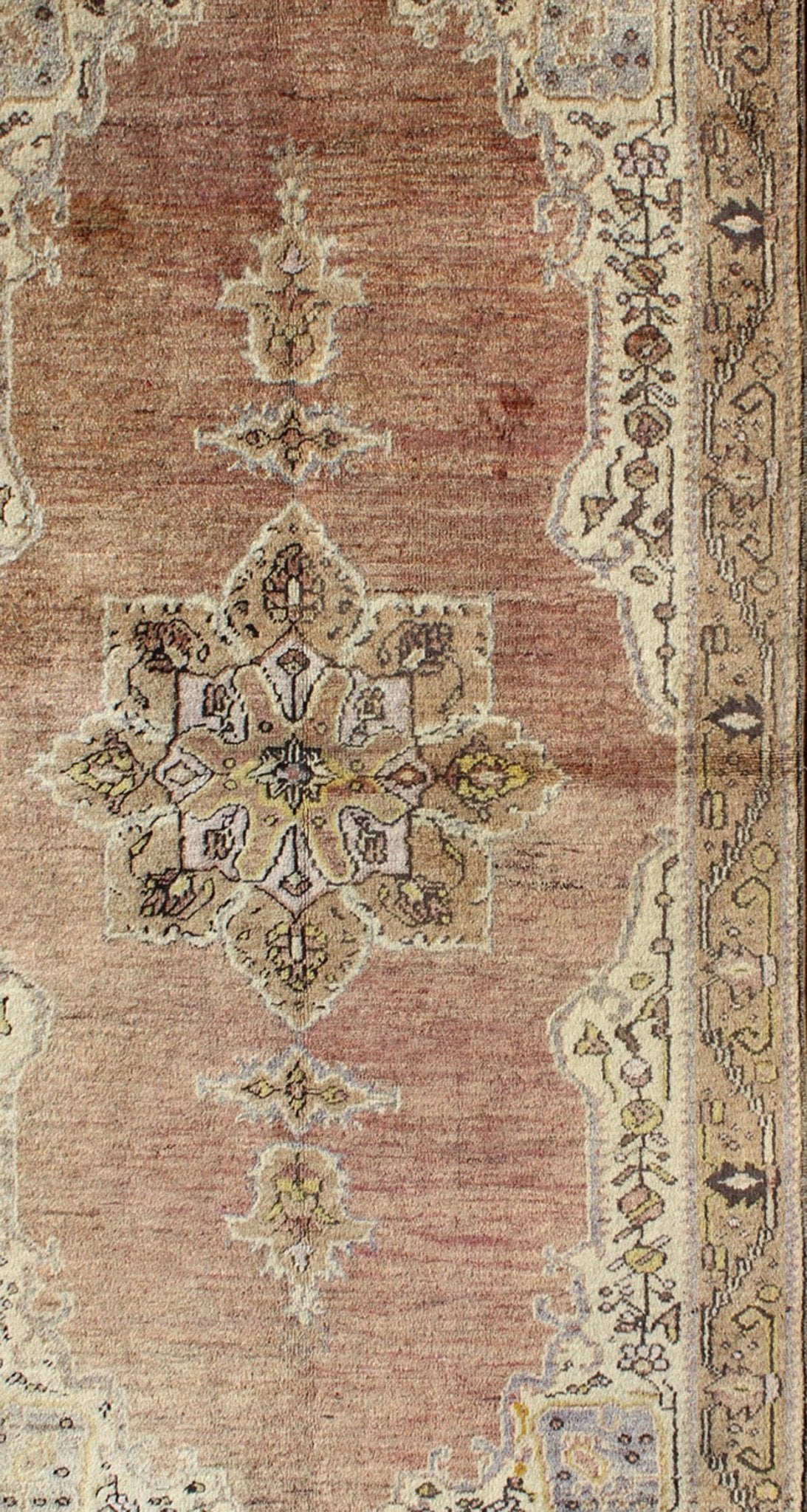 This vintage Turkish Oushak rug features an intricately beautiful design with a stylized floral aesthetic. The central medallion is surrounded by four cornices in the central field. The various shades of cream, yellow, charcoal, and gray blend beautifu... - Keivan Woven ArtsEN - 140587 - 6374Rug