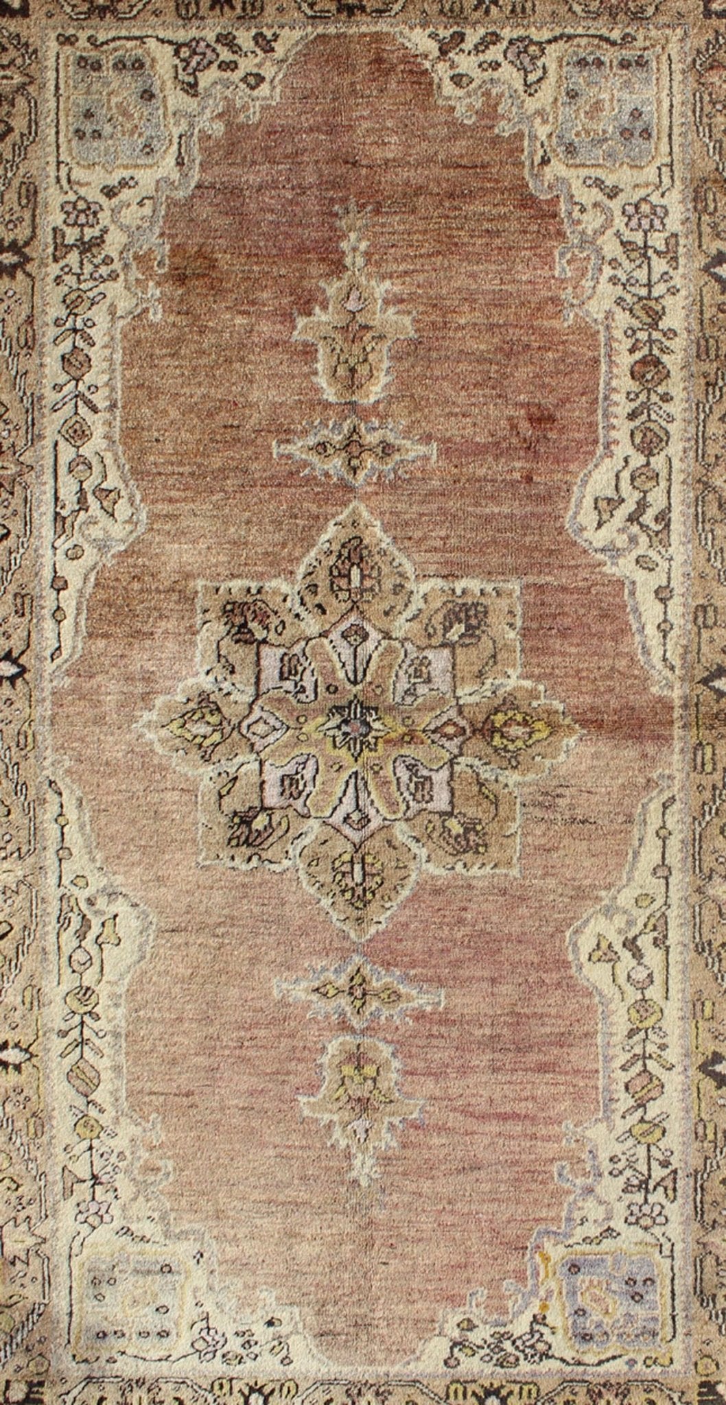 This vintage Turkish Oushak rug features an intricately beautiful design with a stylized floral aesthetic. The central medallion is surrounded by four cornices in the central field. The various shades of cream, yellow, charcoal, and gray blend beautifu... - Keivan Woven ArtsEN - 140587 - 6374Rug