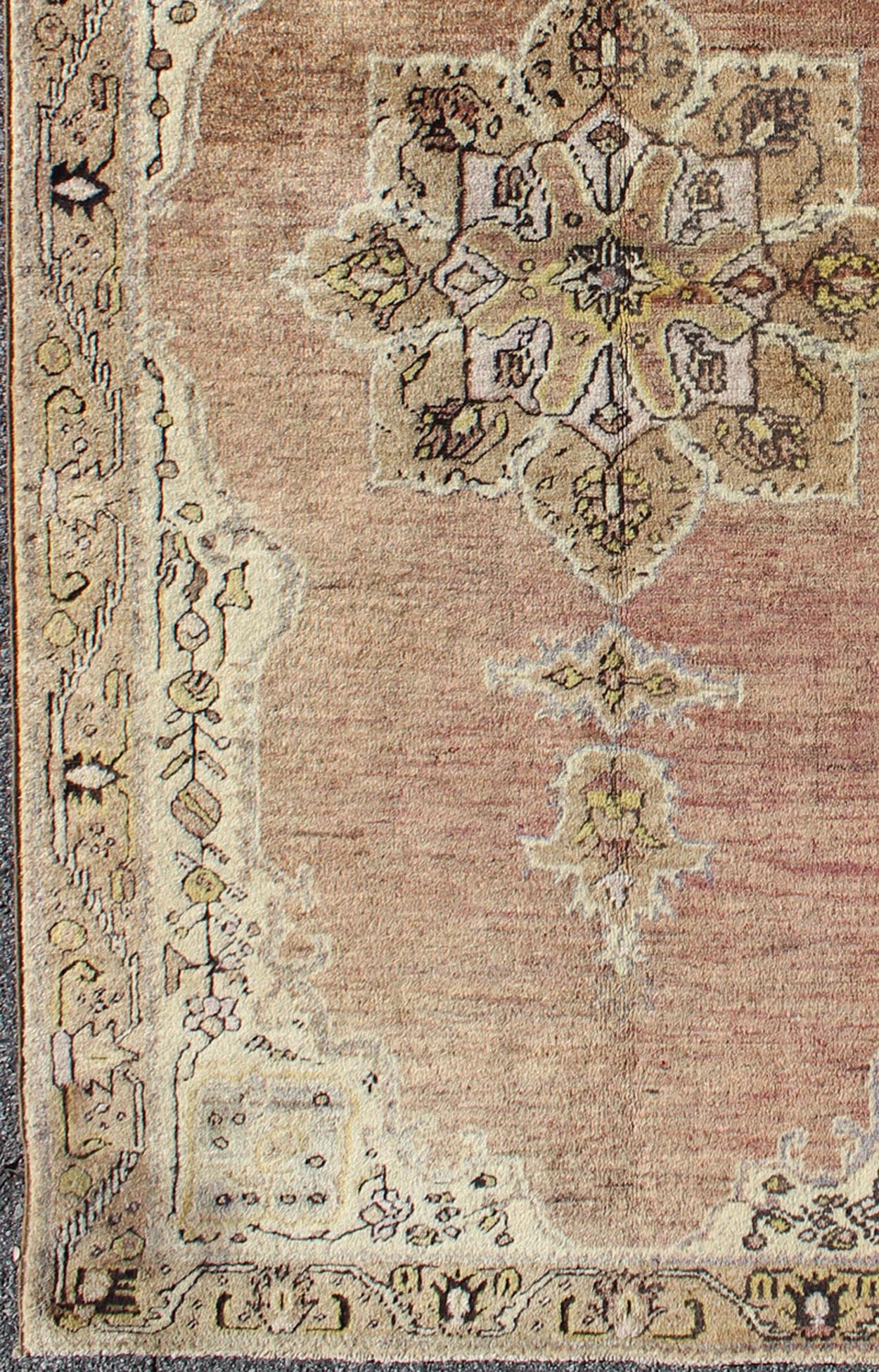 This vintage Turkish Oushak rug features an intricately beautiful design with a stylized floral aesthetic. The central medallion is surrounded by four cornices in the central field. The various shades of cream, yellow, charcoal, and gray blend beautifu... - Keivan Woven ArtsEN - 140587 - 6374Rug
