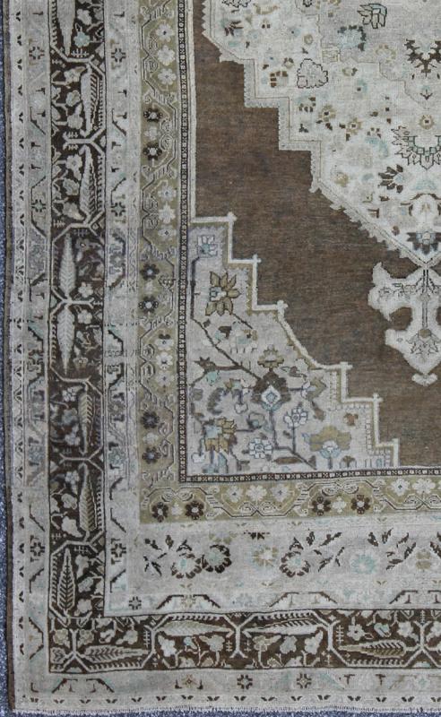 Vintage Turkish Oushak long Rug with Medallion in Brown, Green & Neutral Colors Measures: 7'7 x 12'2 This beautiful Turkish Oushak from mid 20th century Turkey features a Classic medallion Oushak design. The Greenish - brown ground is home ... - Keivan Woven ArtsEN - 140878 - 6638Rug