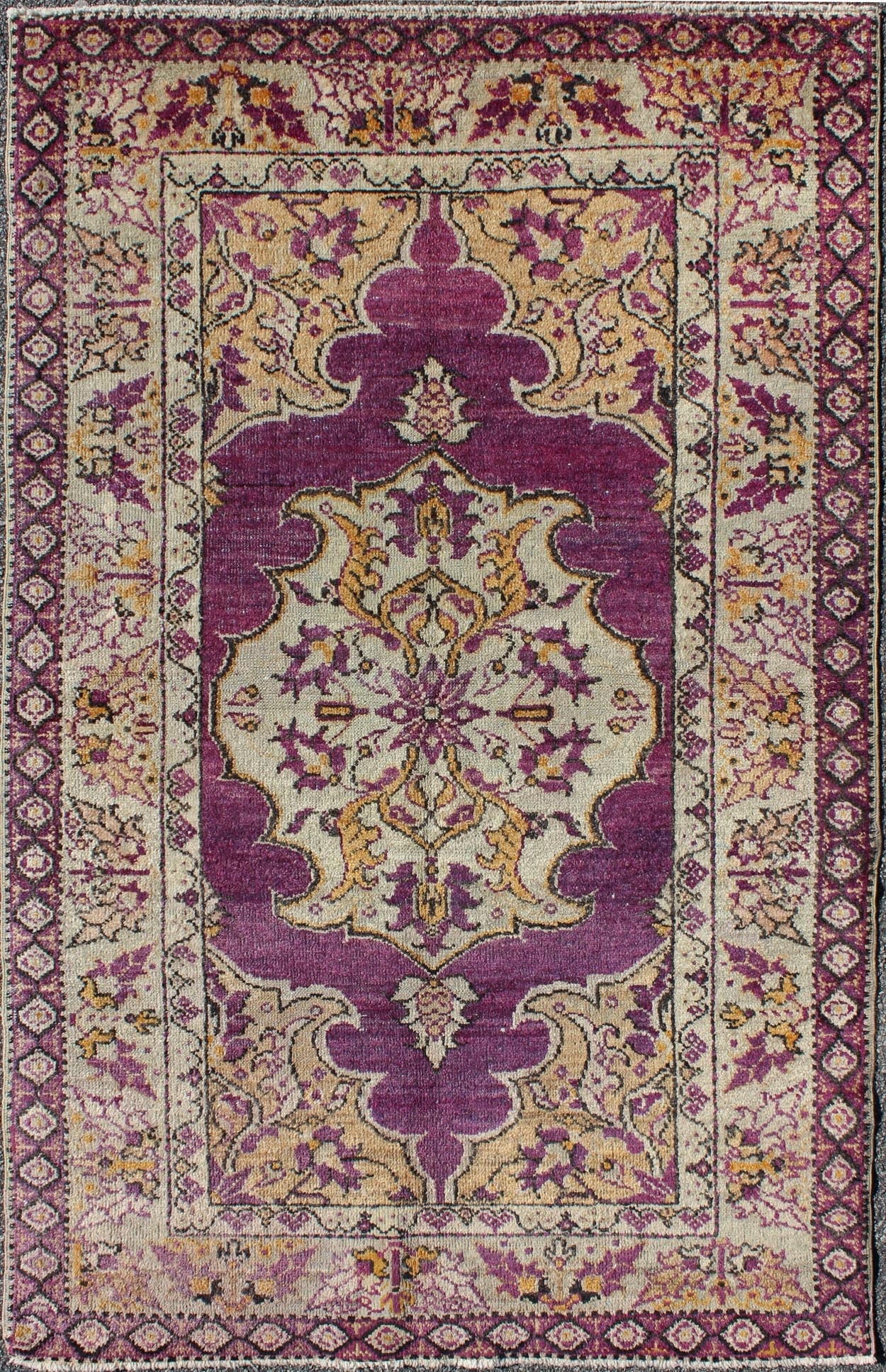 Purple Vintage Turkish Oushak Rug with a Traditional Medallion Design Measures: 3'6'' x 5'8''. This lovely vintage Oushak is set on a purple background and features a floral medallion with accents of deep gold. The taupe border has a unique ... - Keivan Woven ArtsEN - 141034 - 7135Rug