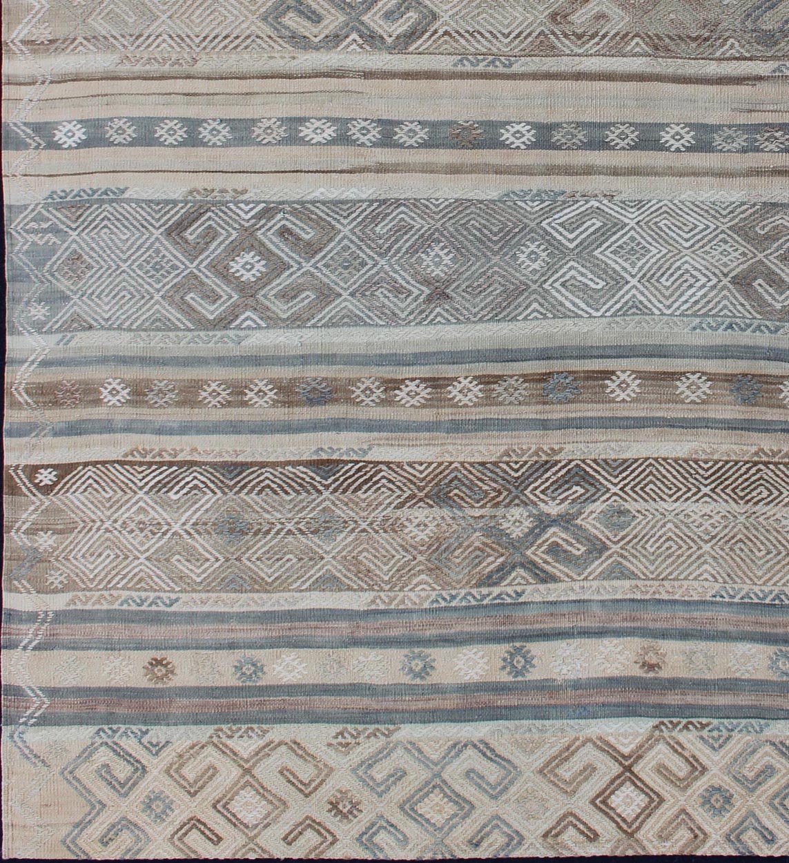 Measures: 5'9 x 7'7. This flat - woven Kilim runner from Turkey features an enticing composition consisting of stripes with fascinating geometric designs rendered in natural tones of brown and gray, as well as some blue shades. Vintage Kil... - Keivan Woven ArtsEN - 141087 - 11177Rug
