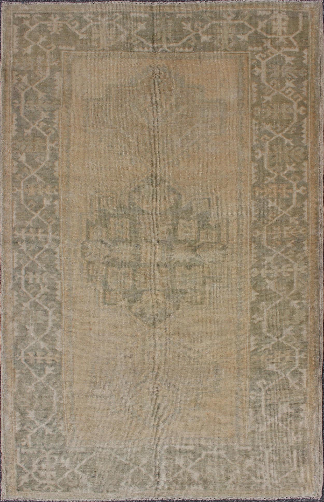 Medallion Vintage Turkish Oushak Rug in Taupe, Green and Sand Colors This vintage Turkish Oushak rug (circa mid - 20th century) features a unique blend of colors and an intricately beautiful design. The central three medallions, two more faint tha... - Keivan Woven ArtsEN - 141655 - 6710Rug