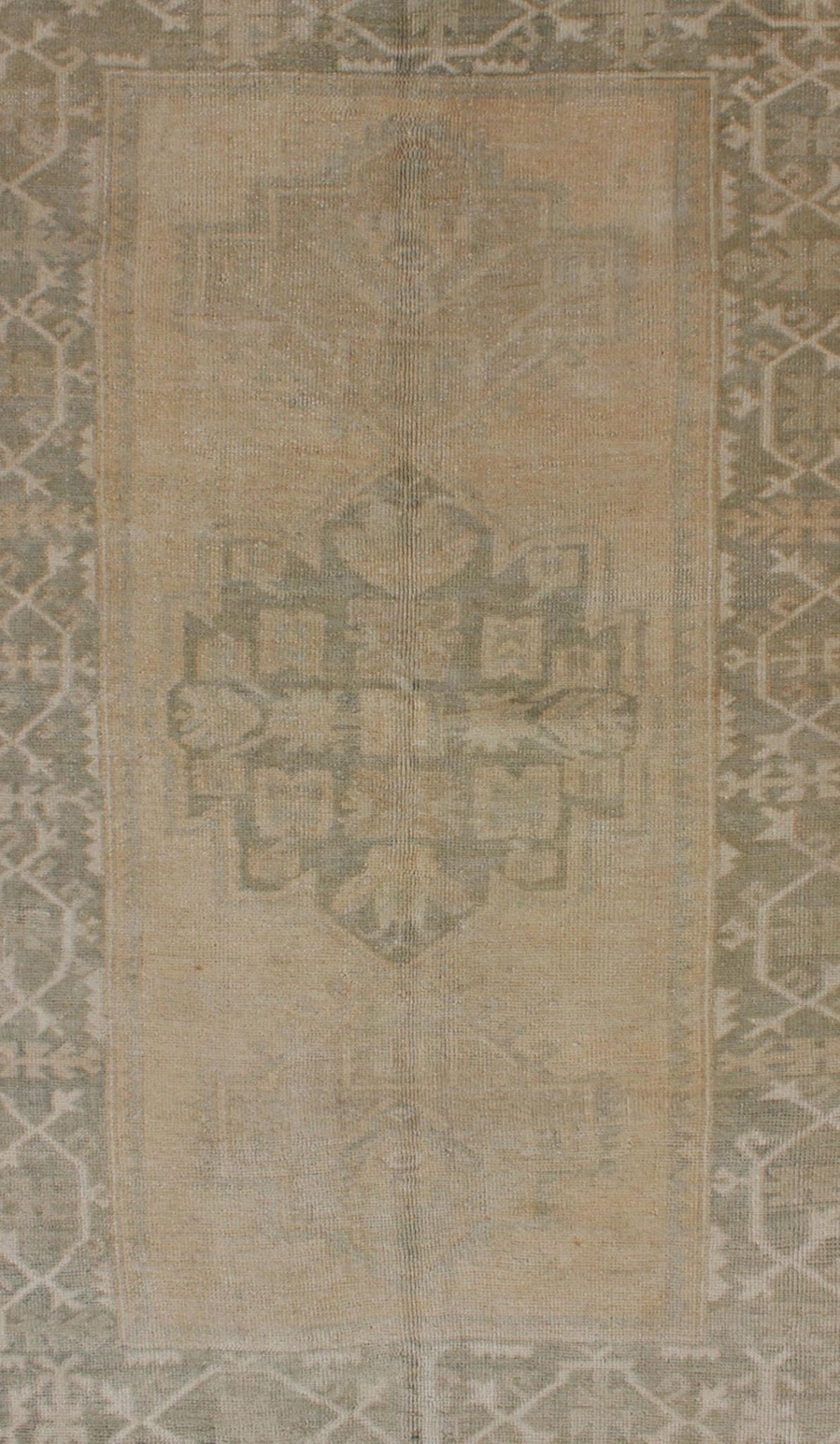 Medallion Vintage Turkish Oushak Rug in Taupe, Green and Sand Colors This vintage Turkish Oushak rug (circa mid - 20th century) features a unique blend of colors and an intricately beautiful design. The central three medallions, two more faint tha... - Keivan Woven ArtsEN - 141655 - 6710Rug