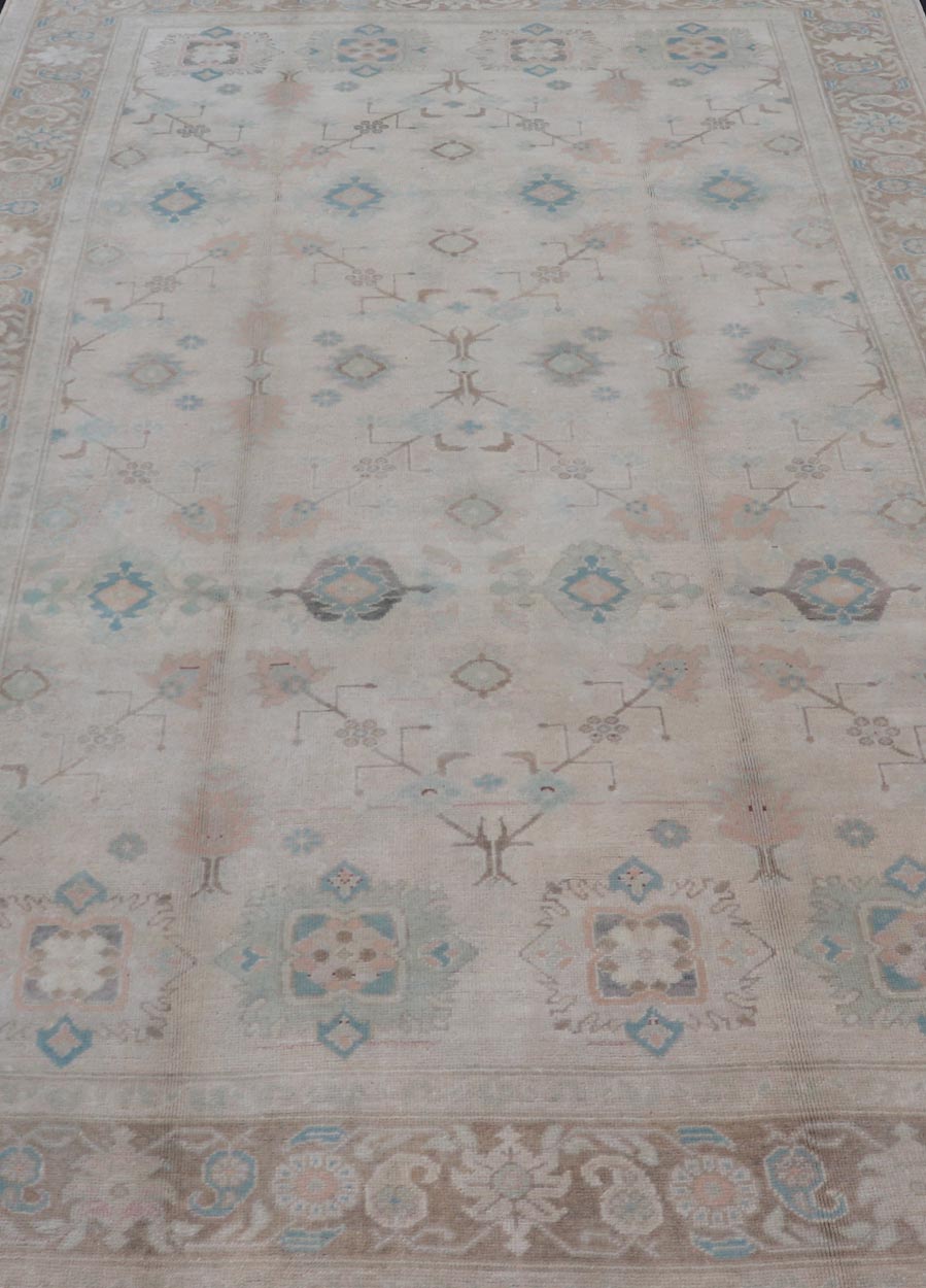 Vintage Turkish Floral Oushak Rug in Pale Gray, Brown and Blue. Country of Origin: Turkey; Type: Oushak; Design: Floral, Oushak Floral; Keivan Woven Arts: rug EN - 141684 Measures: 6'7 x 10'10 This vintage Turkish Oushak showcases very c... - Keivan Woven ArtsEN - 141684 - 6721Rug
