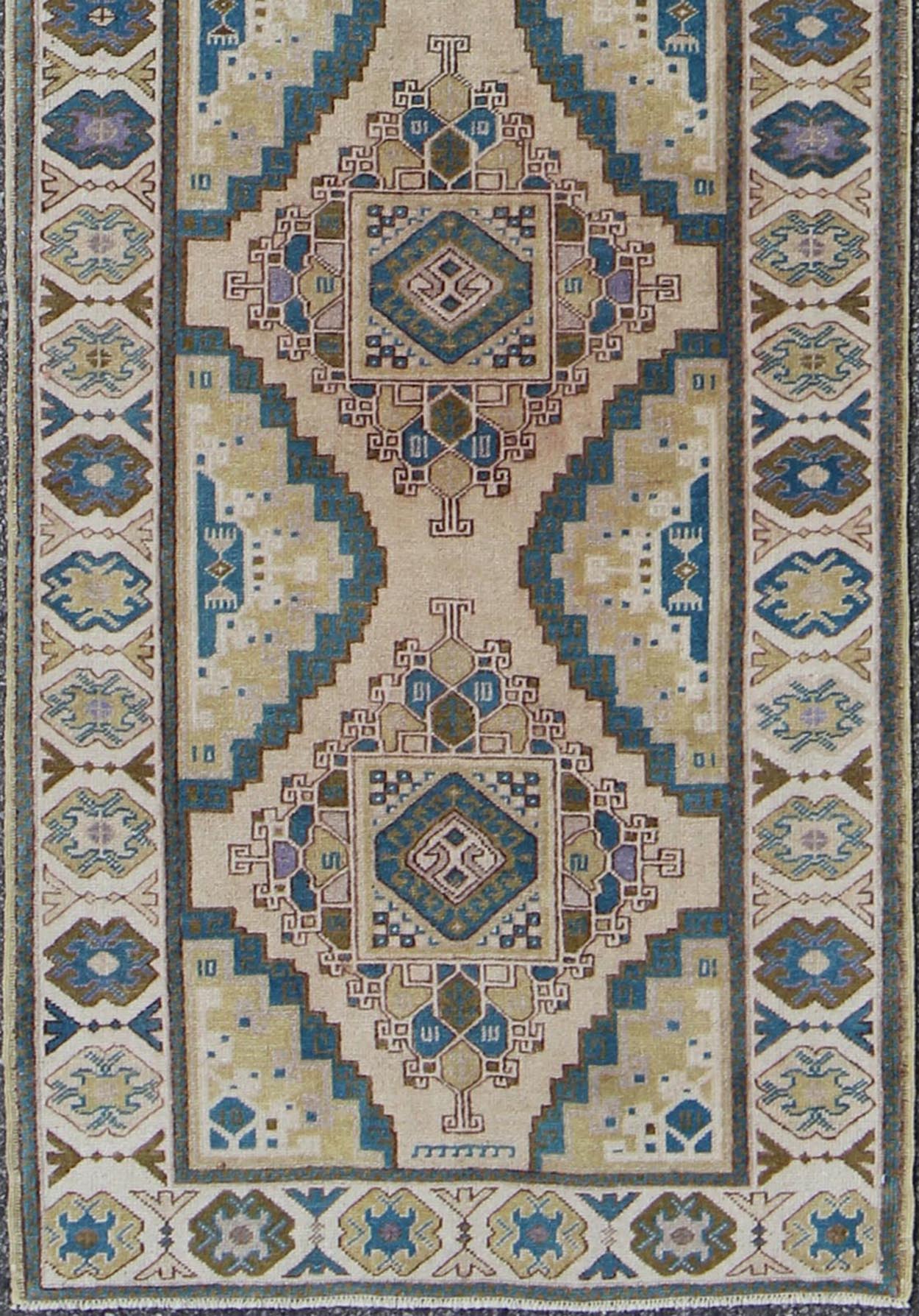 Teal, Green, Blue and Yellow Vintage Turkish Oushak Runner with Geometric Design Measures: 3'1'' x 12'5''. This vintage Turkish Oushak runner (circa 1930) features a unique blend of colors and an intricately beautiful design. The central ... - Keivan Woven ArtsEN - 141711 - 6739Rug