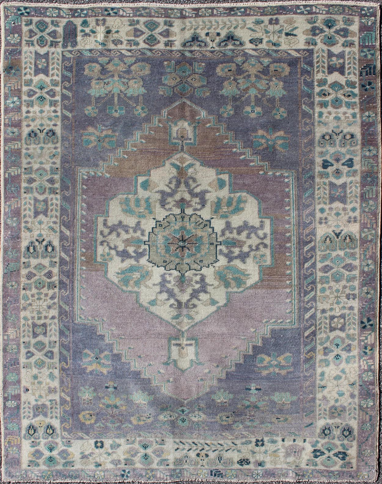 Purple and Teal Vintage Turkish Oushak Rug with Floral Layered Medallion Design Measures: 5'0 x 6'6''. This vintage Turkish Oushak rug features an intricately beautiful design with a floral aesthetic. The central medallion is surrounded by mu... - Keivan Woven ArtsEN - 141744 - 6769Rug