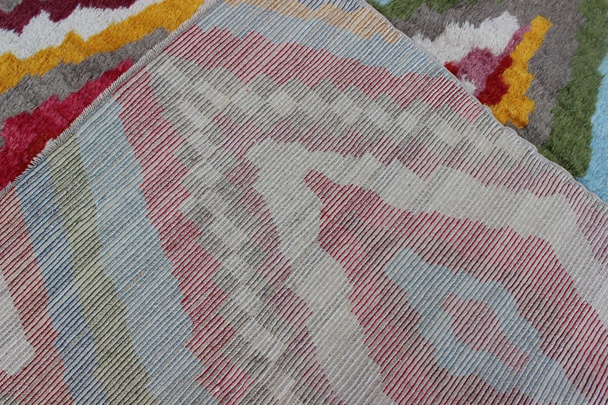 Modern Turkish Angora Tulu Rug with Colorful Diamond Design Measures: 8'6'' X 12'3''. This modern Tulu rug showcases a free - spirited design and stunning colors, such as blue, purple, green, red, yellow, and light blue - grey, all set on an ivor... - Keivan Woven ArtsEN - 142119 - 7841Rug