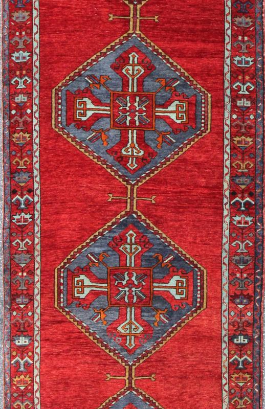 En - 142354, 1940s Vintage Turkish Oushak Gallery Rug Colorful Turkish Oushak Runner in Various Shades of Red, Blue, and Yellow This Turkish Oushak runner features Multiple medallions as well as patterns of smaller, geometric motifs. Colors includ... - Keivan Woven ArtsEN - 142354 - 8375Rug