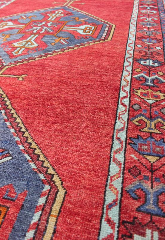 En - 142354, 1940s Vintage Turkish Oushak Gallery Rug Colorful Turkish Oushak Runner in Various Shades of Red, Blue, and Yellow This Turkish Oushak runner features Multiple medallions as well as patterns of smaller, geometric motifs. Colors includ... - Keivan Woven ArtsEN - 142354 - 8375Rug