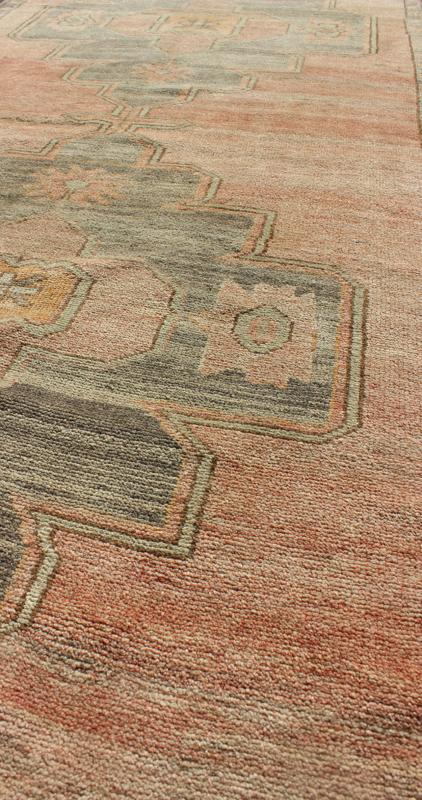 Coral and Pink Turkish Oushak Runner with Medallion Design. Measures: 3'0'' x 11'4''. This lovely Oushak features three center medallions in light grey with a coral central field, characterized by floral blossoms and trellis motifs. The softl... - Keivan Woven ArtsEN - 142371 - 8058Rug