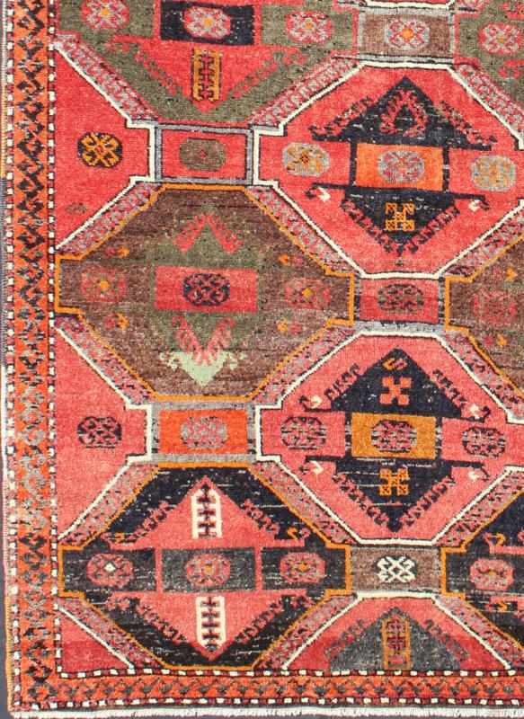 Geometric Medallions Vintage Tribal Oushak Rug in Red, Orange, Charcoal & Brown Measures: 3'10'' x 6'9''. This Turkish Oushak gallery rug (circa mid - 20th Century) features an assortment of geometric medallions that take center stage on a brig... - Keivan Woven ArtsEN - 142608 - 7731Rug