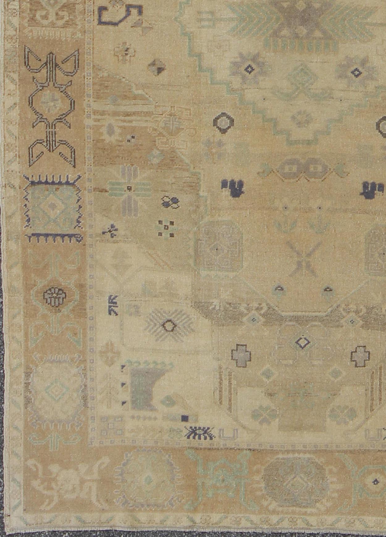 Vintage Turkish Oushak This stunning Turkish Oushak features an open, large - scale, geometric design on taupe and tan background with muted blues and a brown outlines. Measures: 5'6 x 9'3. - Keivan Woven ArtsEN - 142894 - 8074Rug