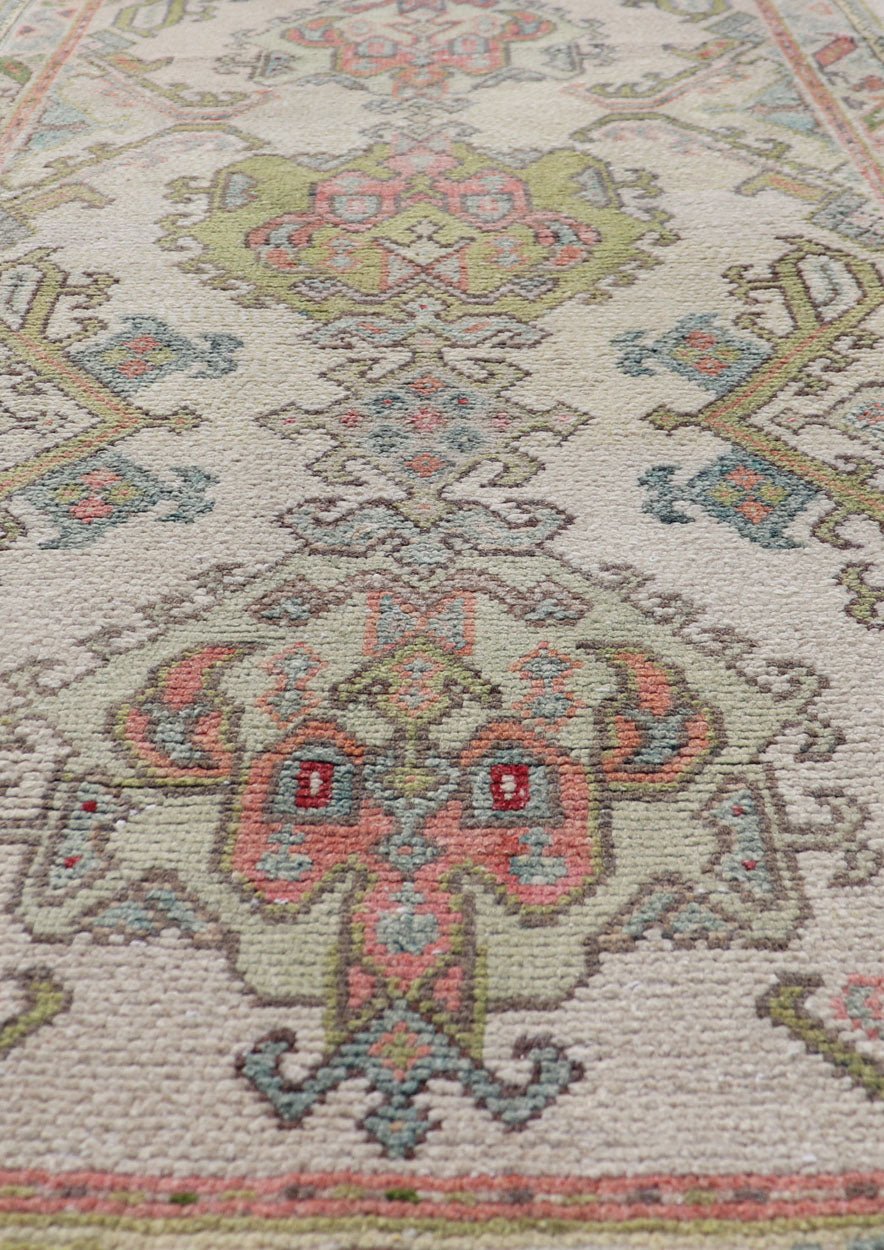 Measures: 2'10 x 5'8 Layered Medallion Vintage Turkish Area Rug Oushak with Geometric Motifs. Country of origin: Turkey; type: Oushak; design: Medallion; Keivan Woven Arts: rug EN - 14495; Layered medallion antique Turkish Oushak rug sub - geometric mo... - Keivan Woven ArtsEN - 14495 - 22782Rug