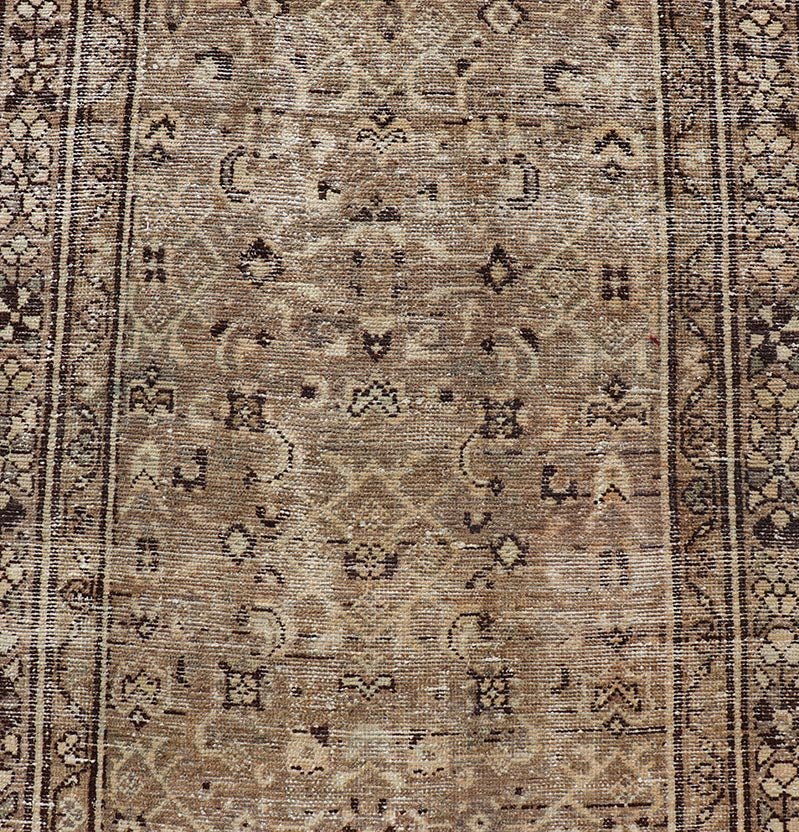Measures: 3'0 x 9'2 Persian Hamadan Runner in Warm Tones of Tan, Taupe, Brown, and L. Brown. Country of Origin: Iran; Type: Hamedan; Design: Floral, Persian Floral, All - Over; Keivan Woven Arts: rug EN - 14507. This vintage Persian runner feat... - Keivan Woven ArtsEN - 14507 - 18692Rug