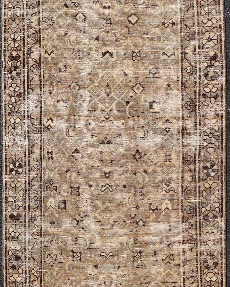 Measures: 3'0 x 9'2 Persian Hamadan Runner in Warm Tones of Tan, Taupe, Brown, and L. Brown. Country of Origin: Iran; Type: Hamedan; Design: Floral, Persian Floral, All - Over; Keivan Woven Arts: rug EN - 14507. This vintage Persian runner feat... - Keivan Woven ArtsEN - 14507 - 18692Rug