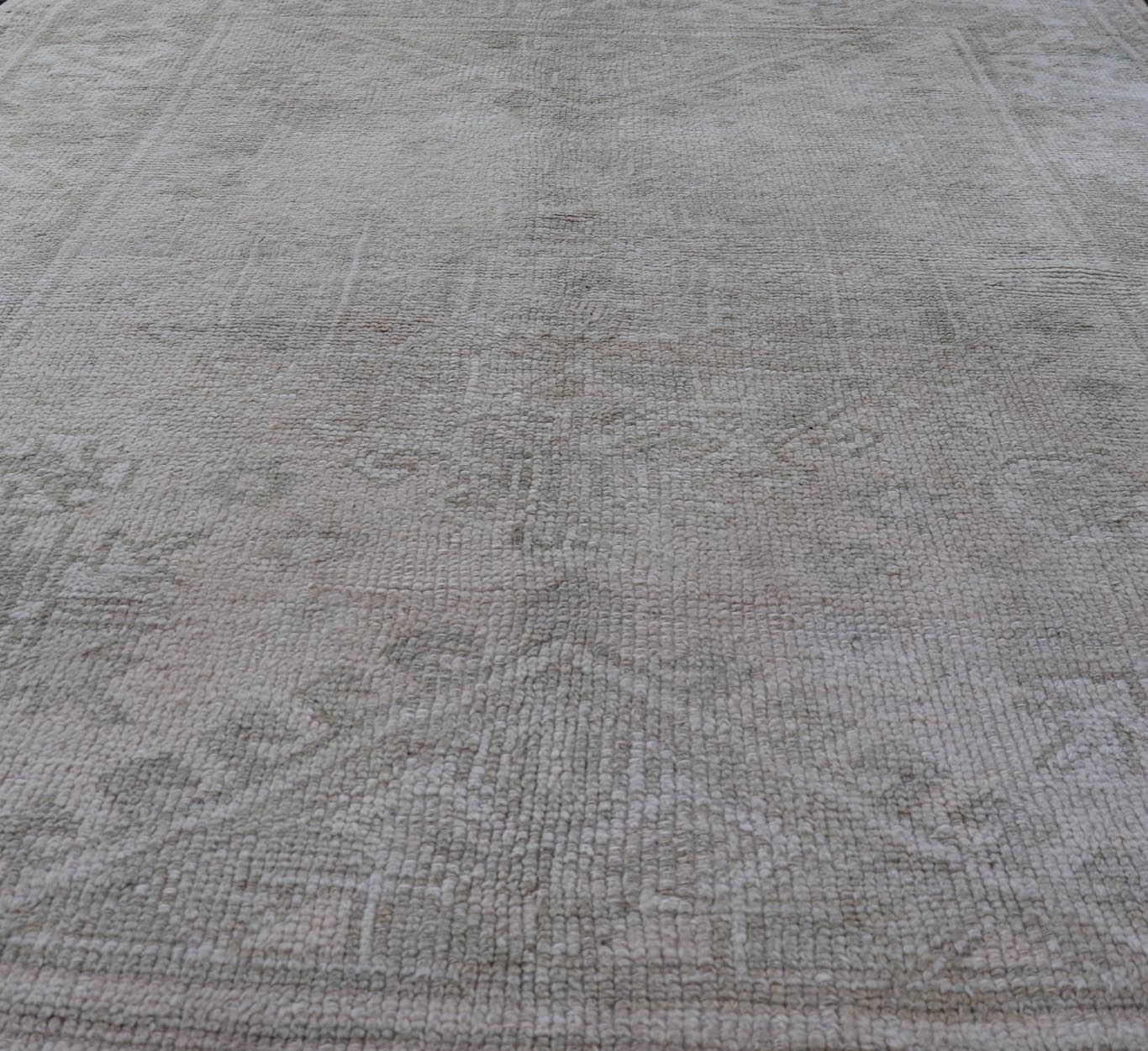 Vintage Geometric Oushak With Subtle Colors by Keivan Woven Arts Vintage Geometric Oushak with Subtle Colors by Keivan Woven Arts rug /EN - 14614 Measures: 4'6 x 5'6 This vintage Oushak rug features subtle geometric patterns and a me... - Keivan Woven ArtsEN - 14614 - 26382Rug