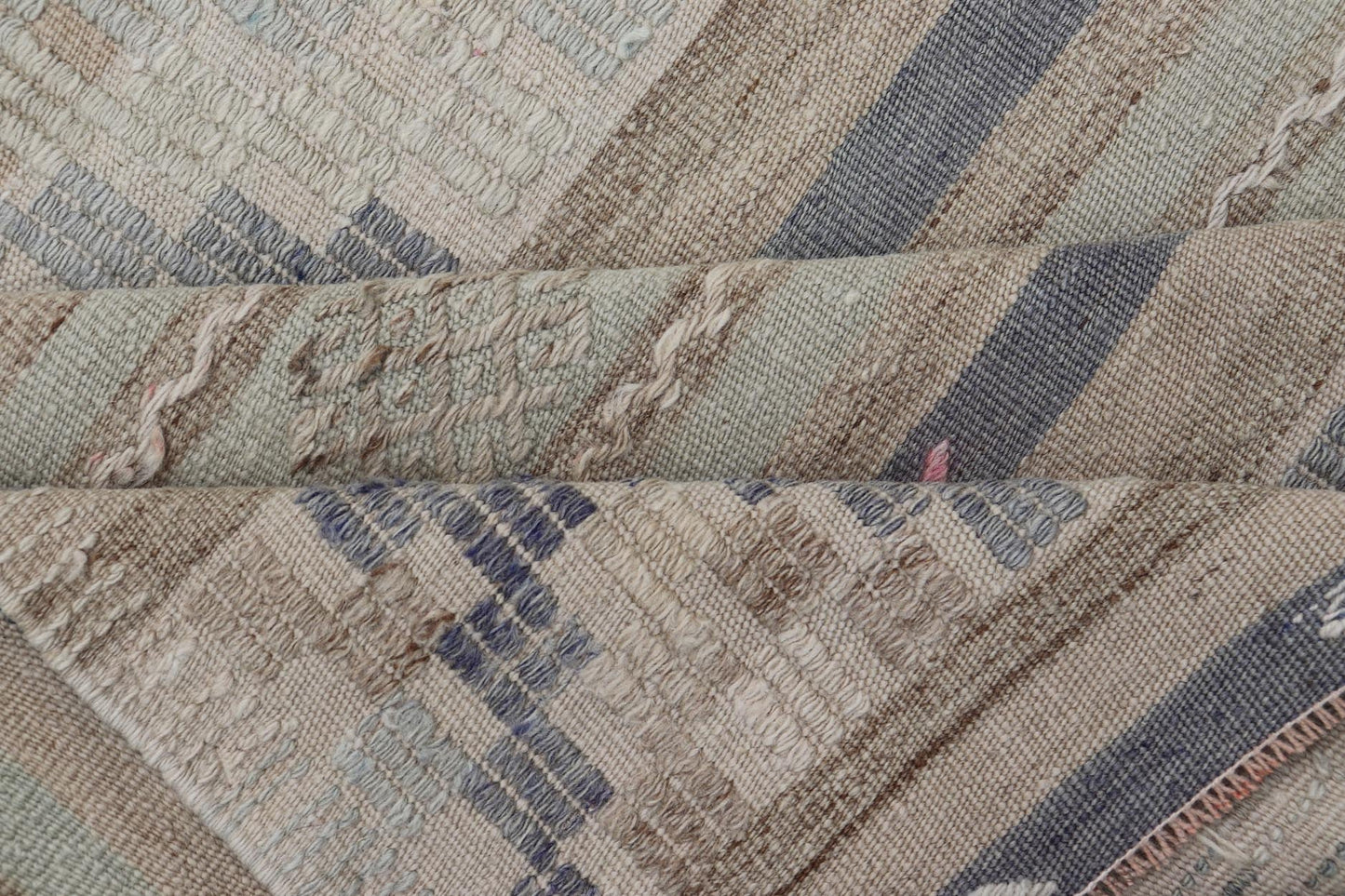 This flat - woven Kilim from Turkey features an enticing composition consisting of stripes with fascinating geometric designs rendered in natural tones of brown and gray, as well as some light green shades. Vintage Kilim with Stripes and Geometri... - Keivan Woven ArtsEN - 14668 - 23971Rug