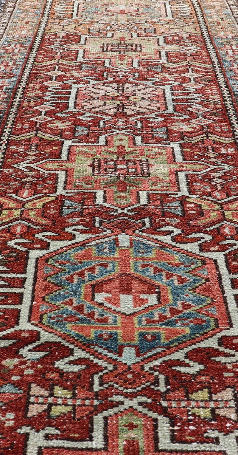 Measures: 1'10 x 6'0 Persian Antique Heriz Distressed Small Runner with Geometrics in Multi - Color. Keivan Woven Arts / rug EN - 15150, country of origin / type: Iran / Heriz, circa 1920 This antique Persian Heriz runner, from northwest Iran, di... - Keivan Woven ArtsEN - 15150 - 21871Rug