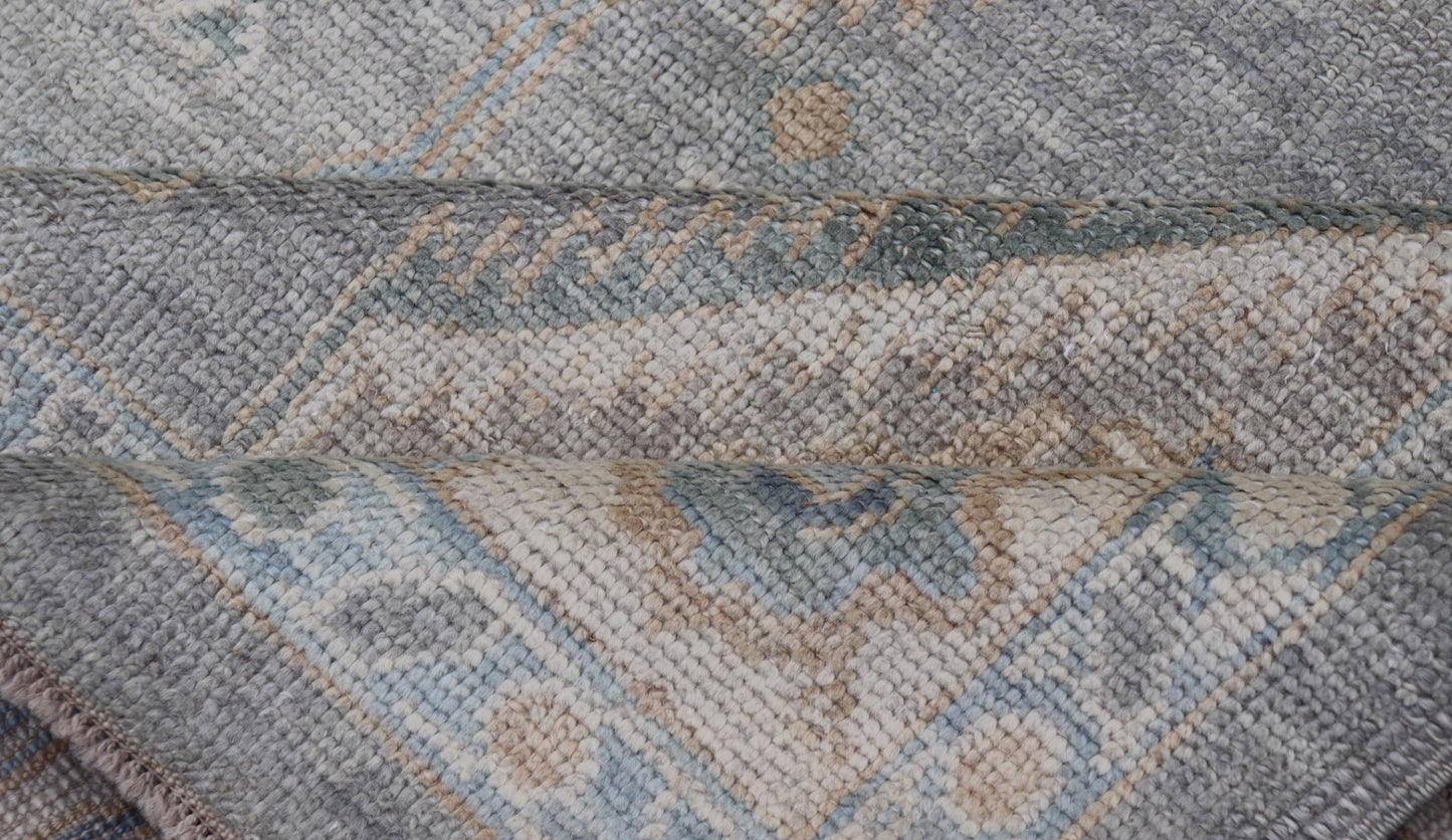 Measures: 7'3 x 10'4 Turkish Modern Oushak Rug in Medallion Design in Gray - Blue, and Marigold. Keivan Woven Arts / rug EN - 15208, country of origin / type: Turkey / Oushak This traditional Oushak rug from Turkey features a subdued, neutral co... - Keivan Woven ArtsEN - 15208 - 22416