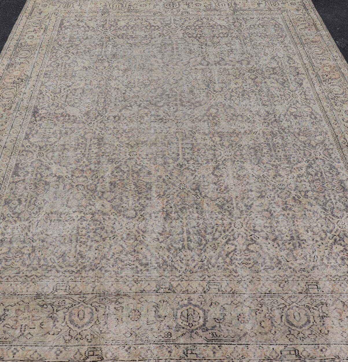 All - Over Vintage Turkish Distressed Rug in Cream, Lavender, Taupe, and Green. Keivan Woven Arts / rug EN - 15415, country of origin / type: Turkey / Oushak, circa 1950. Measures: 7'9 x 11'2 This distressed rug Turkish vintage rug bears... - Keivan Woven ArtsEN - 15415 - 23690Rug