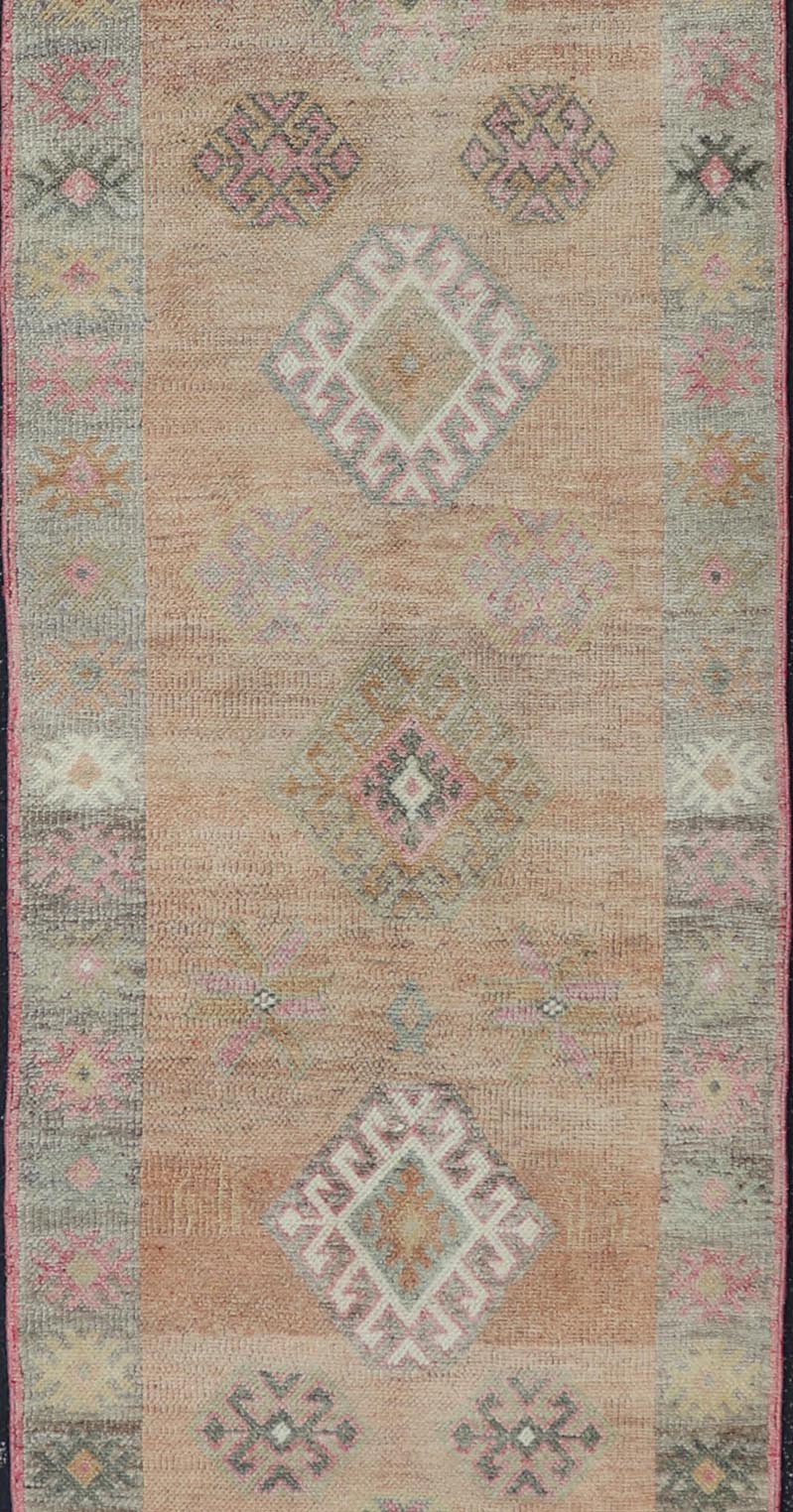 Vintage Tulu Runner in Geometric shapes and soft tones by Keivan Woven Arts Measures: 2'11 X 12'8 This Turkish Tulu runner features a series of geometric motifs and patterns by Keivan Woven Arts, rug number EN - 15519. The vintage Tulu run... - Keivan Woven ArtsEN - 15519 - 26532Rug
