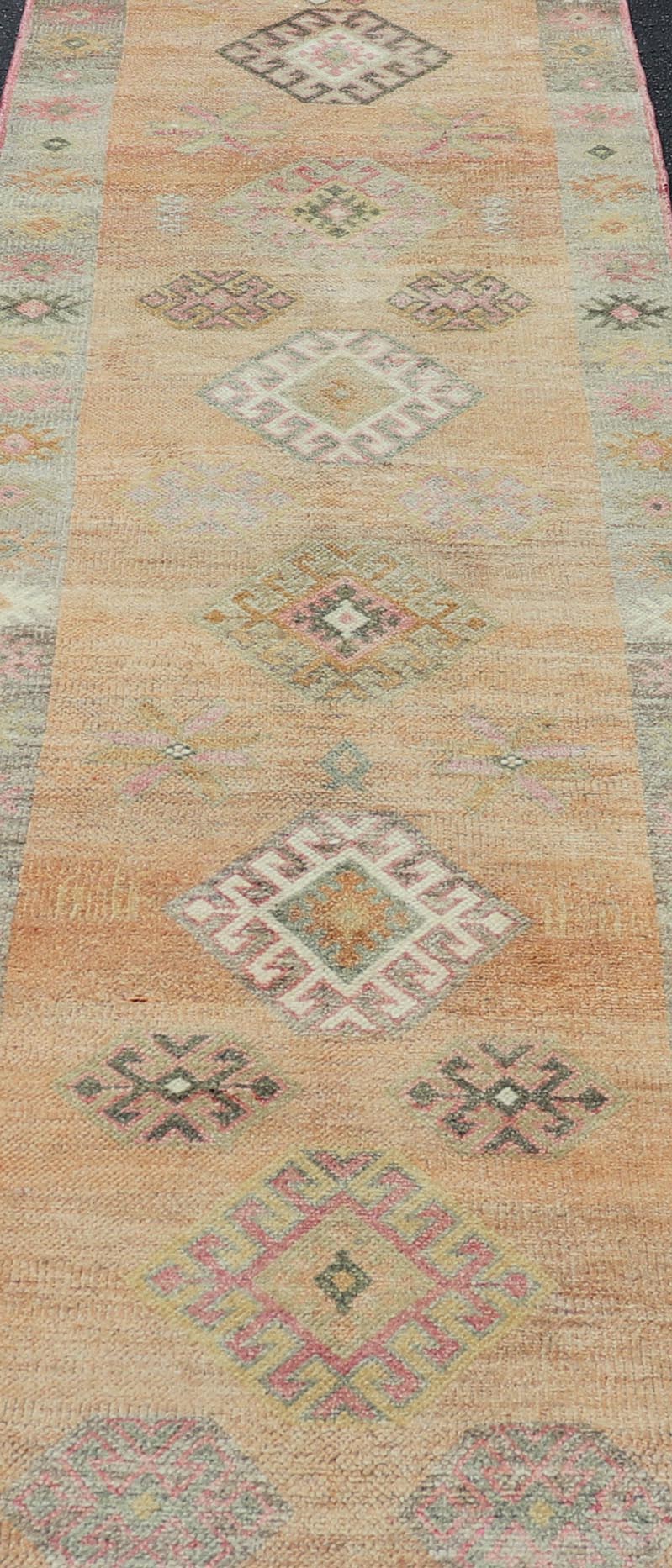 Vintage Tulu Runner in Geometric shapes and soft tones by Keivan Woven Arts Measures: 2'11 X 12'8 This Turkish Tulu runner features a series of geometric motifs and patterns by Keivan Woven Arts, rug number EN - 15519. The vintage Tulu run... - Keivan Woven ArtsEN - 15519 - 26532Rug