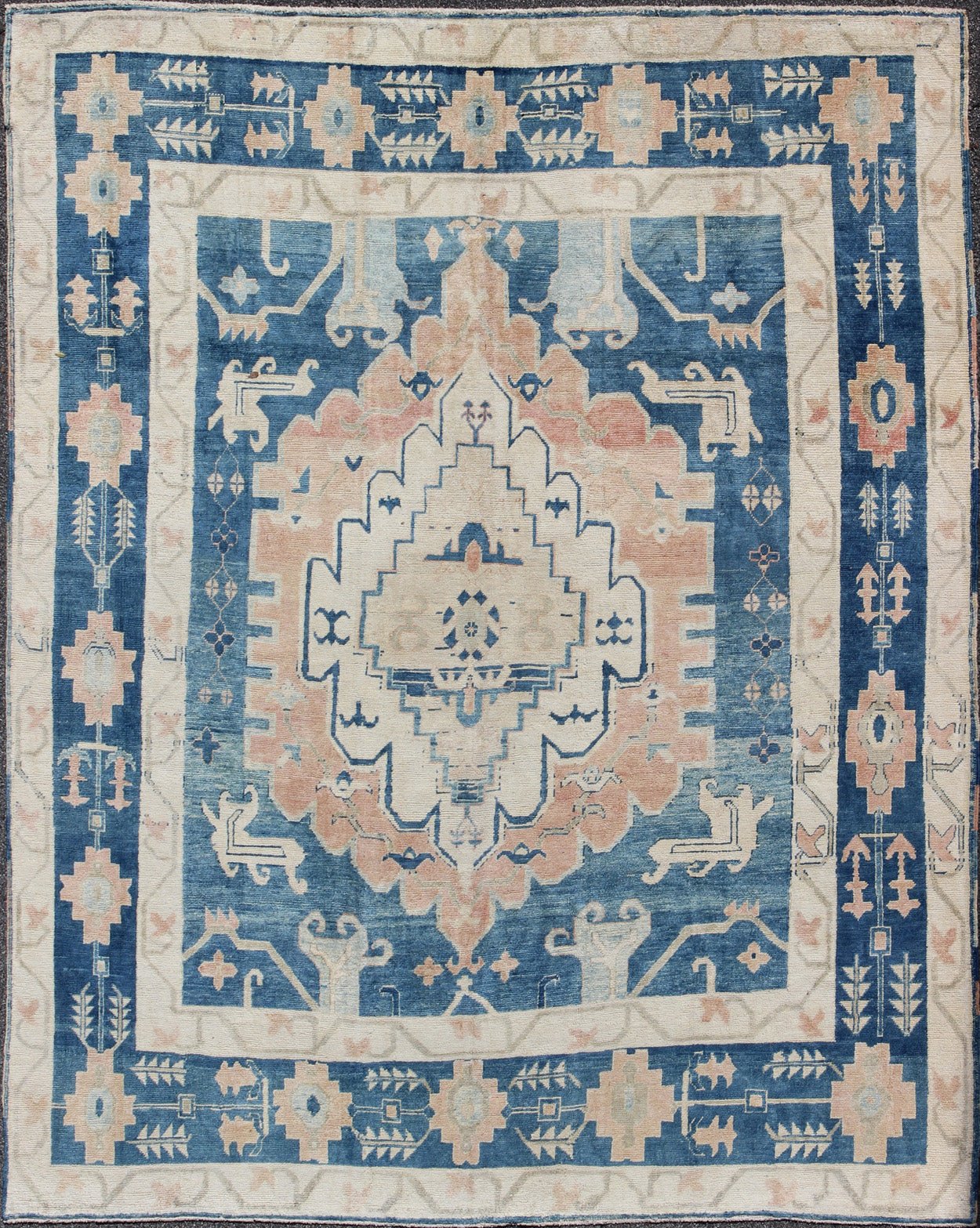 Blue and Salmon Vintage Turkish Oushak Rug with Layered Medallion and Motifs. Keivan Woven Arts / rug / EN - 165189, country of origin / type: Turkey / Oushak, Mid - 20th century. Measures: 9'11 x 11'8. This beautiful vintage rug from mid - 20th centu... - Keivan Woven ArtsEN - 165189 - 9016Rug