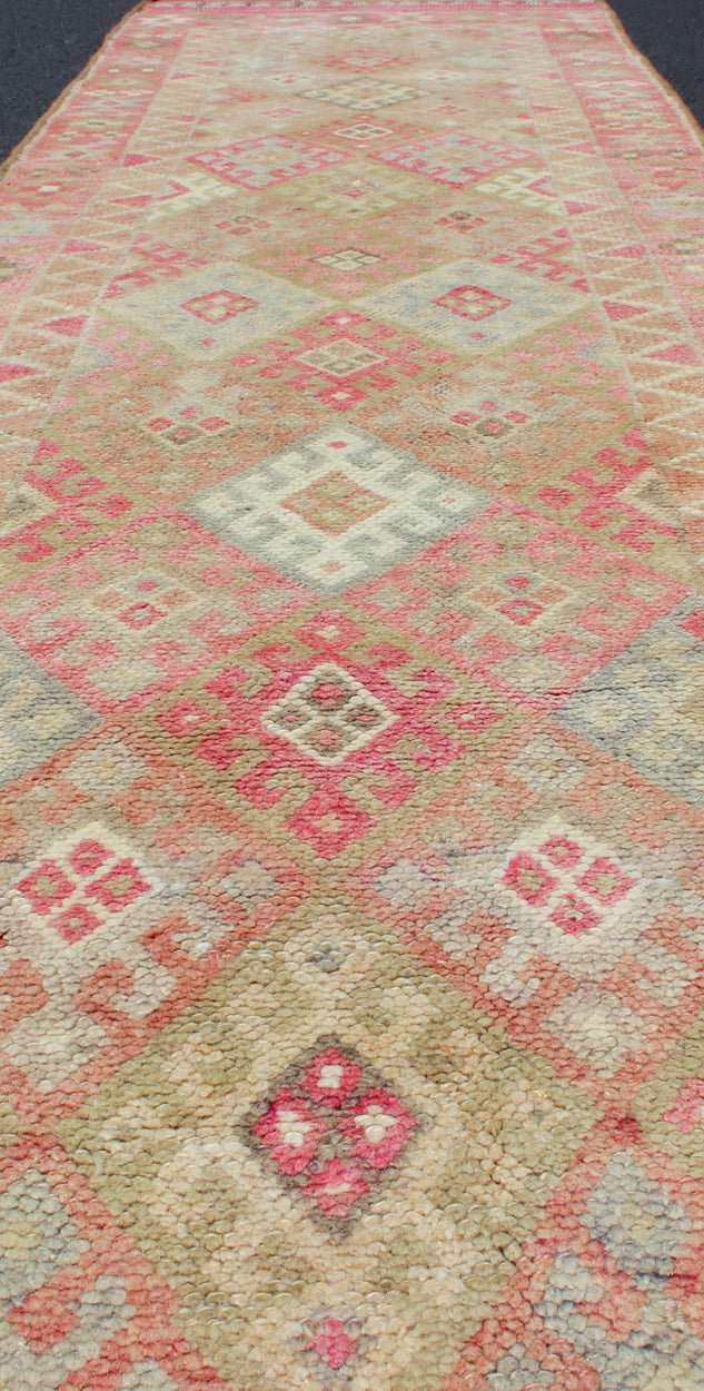 Geometric Kurdish Design Vintage Runner from Turkey in Pink, Red & Green Colors. Unique Runner in Light Green, pink red colored Turkish runner in Kurdish design, rug en - 165332, country of origin / type: Turkey / Turkish. This runner from... - Keivan Woven ArtsEN - 165332 - 11365Rug