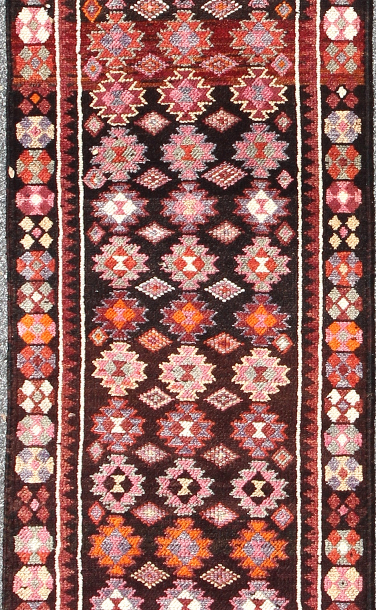 Black and Brown Background Colorful Vintage Turkish Runner with Geometric Design, rug en - 165383, country of origin / type: Turkey / Oushak, circa 1950 This vintage Turkish runner (circa mid - 20th century) features a unique blend of colors and an ... - Keivan Woven ArtsEN - 165383 - 9026Rug