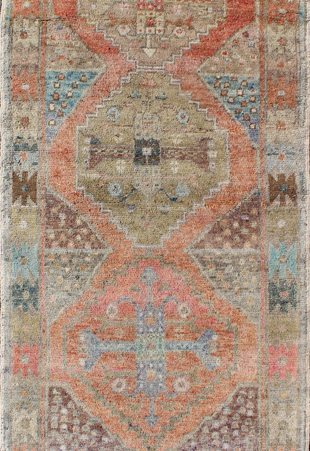 Antique Turkish Oushak Runner in Coral, Blue, Brown, Yellow Green & Rust Red Amazingly Beautiful antique Oushak runner with Geometric Medallion Design, rug EN - 165772 , country of origin / type: Turkey / Oushak, circa 1930 The painting li... - Keivan Woven ArtsEN - 165772 - 9496Rug
