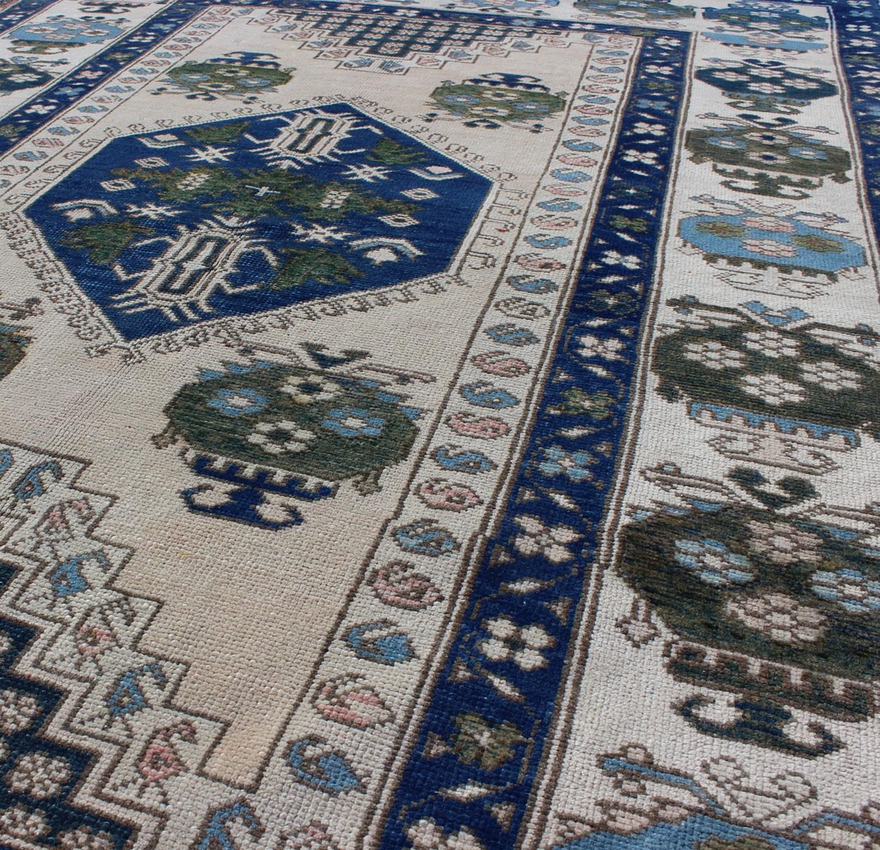 Blue and Green Geometric Oushak Vintage Rug with Medallion. Vintage Oushak carpet in geometric design with variety of blue colors, green, taupe, tan and ivory. rug/EN - 165827, country of origin / type: Turkey / Oushak, circa 1950 This ... - Keivan Woven ArtsEN - 165827 - 9500Rug