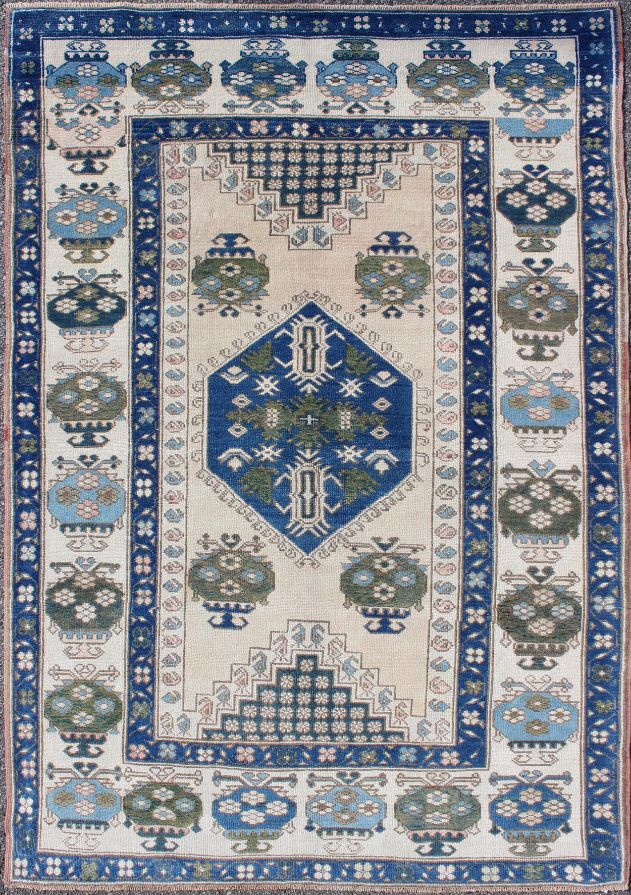 Blue and Green Geometric Oushak Vintage Rug with Medallion. Vintage Oushak carpet in geometric design with variety of blue colors, green, taupe, tan and ivory. rug/EN - 165827, country of origin / type: Turkey / Oushak, circa 1950 This ... - Keivan Woven ArtsEN - 165827 - 9500Rug