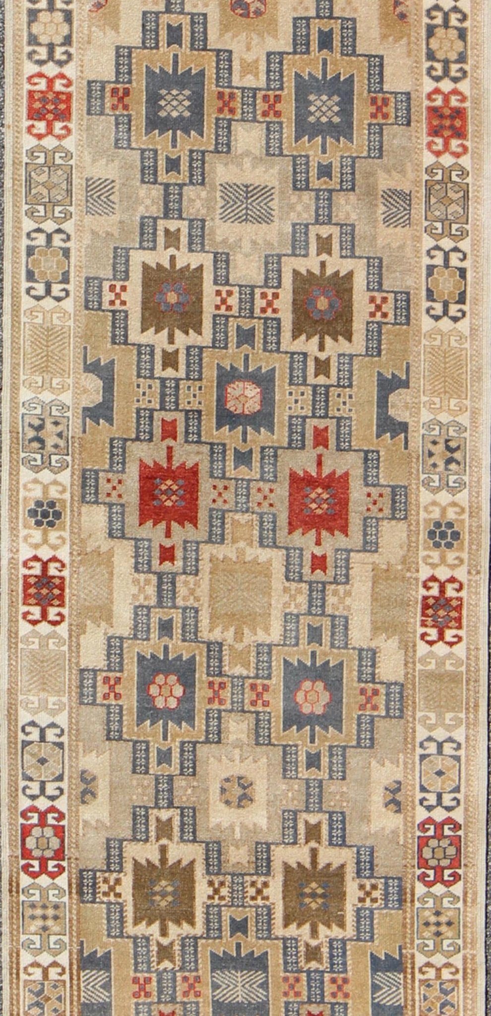 Fabulous Turkish Antique Oushak Runner with Geometric Motifs in Multi Colors. Exciting Multi - Colored Geometric Medallions in the field complemented by repeating geometric elements in the border. Antique Oushak Runner, rug tu - vey - 4811, country o... - Keivan Woven ArtsEN - 165866 - 9508Rug