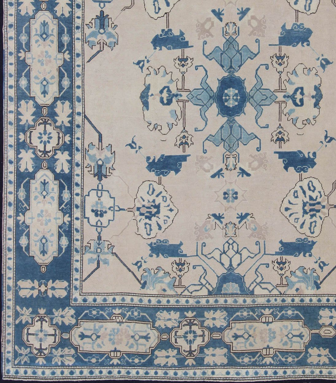 Oushak Rug from Mid - 20th Century Turkey with Blue and Cream Tribal Design Vintage Turkish Oushak in Cream and Blue, rug en - 165875, country of origin / type: Turkey / Oushak, circa 1940 This tribal design Oushak carpet features an array of... - Keivan Woven ArtsEN - 165875 - 11249Rug