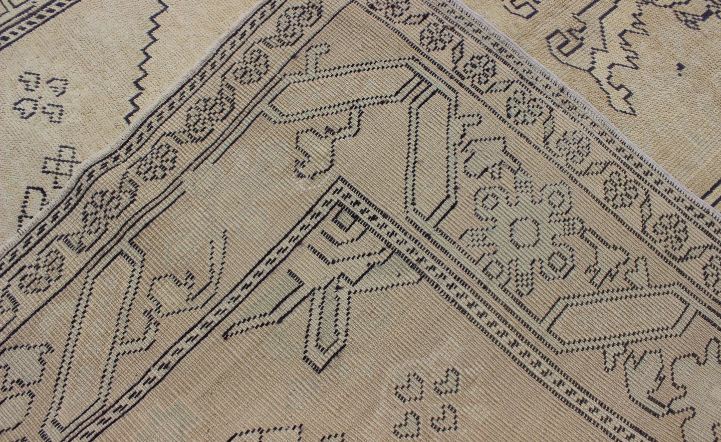 Vintage Cream and Charcoal Turkish Oushak Rug With Stylized Medallion Design Measures 5'0 x 8'7 This Turkish vintage Oushak rug, (circa 1940) features an intricately beautiful and highly stylized design. The central medallion is compleme... - Keivan Woven ArtsEN - 1781 - 5289Rug