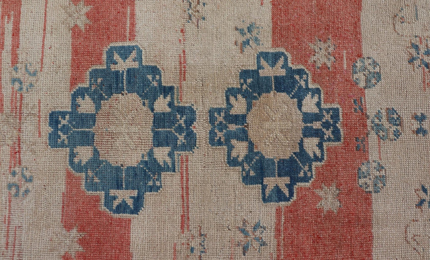 Tribal Medallion Design Vintage Turkish Oushak in Cream, Blue, and Terracotta Measures: 4'5 x 6'7 This vintage Oushak has repeating motifs in terracotta, cream, and blue encasing multiple motifs and the striped field. The eccentric fiel... - Keivan Woven ArtsEN - 178200 - 18884Rug