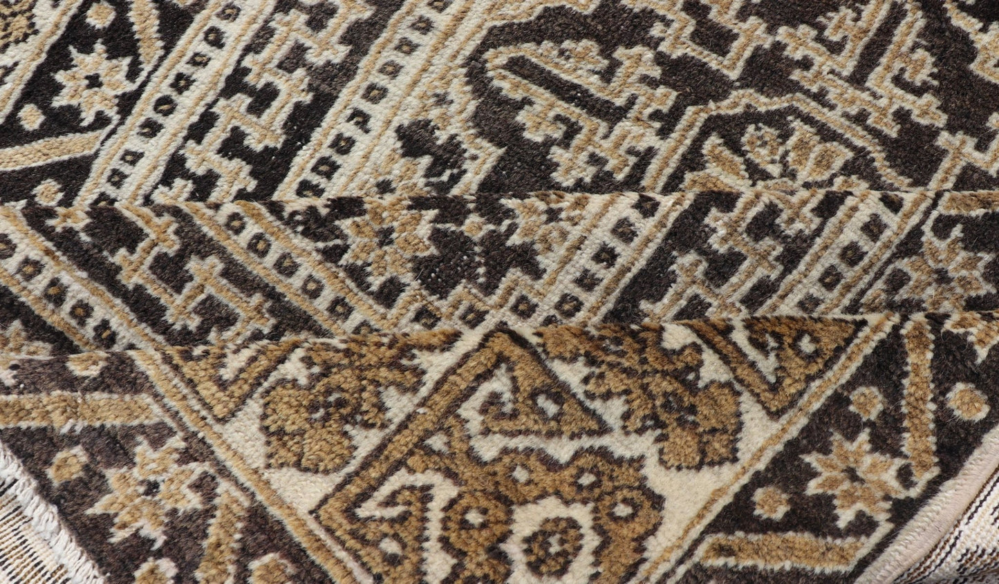 Turkish Konya Carpet in Shades of Brown, rug EN - 178916, country of origin / type: Turkey / Oushak, circa mid - 20th Century. Measures:4'2 x 6'3 All - Over with Medallion Design Turkish Carpet in Shades of Brown and Cream - Keivan Woven ArtsEN - 178916 - 17526