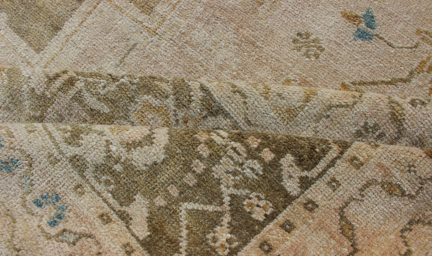 Medallion Vintage Turkish Oushak Rug in Olive Green, Army Green, Tan, Teal & Yellow and Muted Tones. Beautiful and unique color Turkish Oushak vintage in Olive and Army green background and border, and soft tones of tan. taupe, blush yellow and... - Keivan Woven ArtsEN - 179178 - 11992Rug