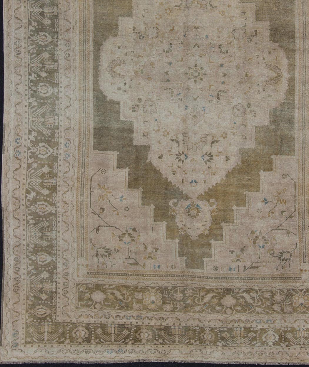 Medallion Vintage Turkish Oushak Rug in Olive Green, Army Green, Tan, Teal & Yellow and Muted Tones. Beautiful and unique color Turkish Oushak vintage in Olive and Army green background and border, and soft tones of tan. taupe, blush yellow and... - Keivan Woven ArtsEN - 179178 - 11992Rug