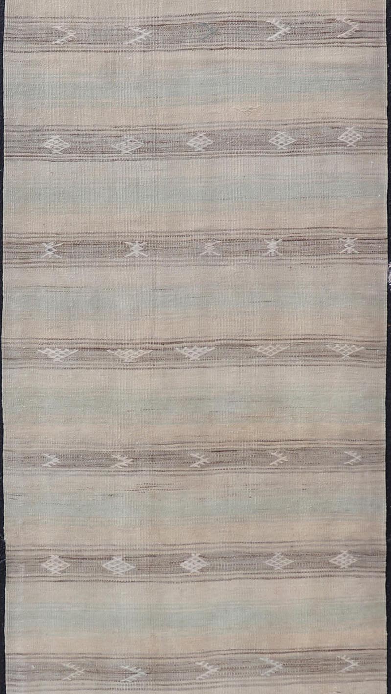 Vintage Turkish Kilim Runner with Horizontal Stripes and Tribal Motifs Vintage Kilim Runner, rug EN - 179377, country of origin / type: Turkey / Kilim, circa Mid - 20th Century. Measures: 2'8 x 10'10. - Keivan Woven ArtsEN - 179377 - 18601Rug