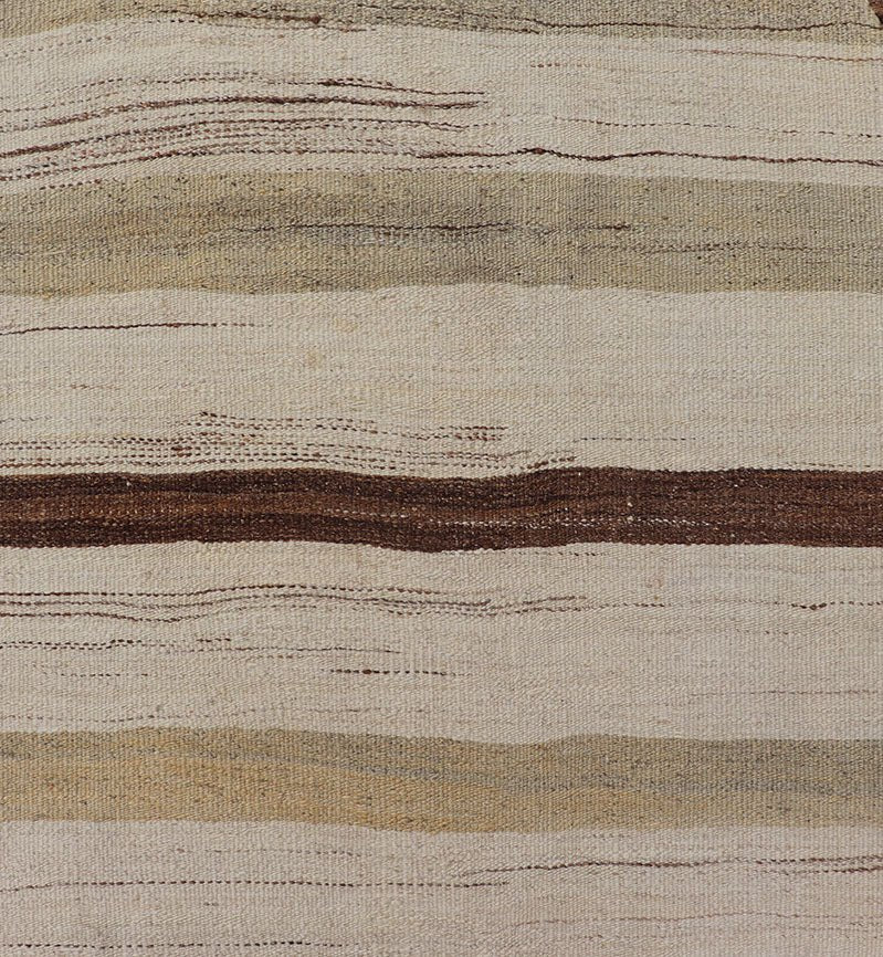 Minimalist design with traces of stripes Kilim runner in cream, light brown and taupe, Keivan Woven Arts / rug EN - 179919, country of origin / type: Turkey / Kilim, circa 1950 This flat - woven Kilim runner from Turkey features an understated compo... - Keivan Woven ArtsEN - 179919 - 17796Rug