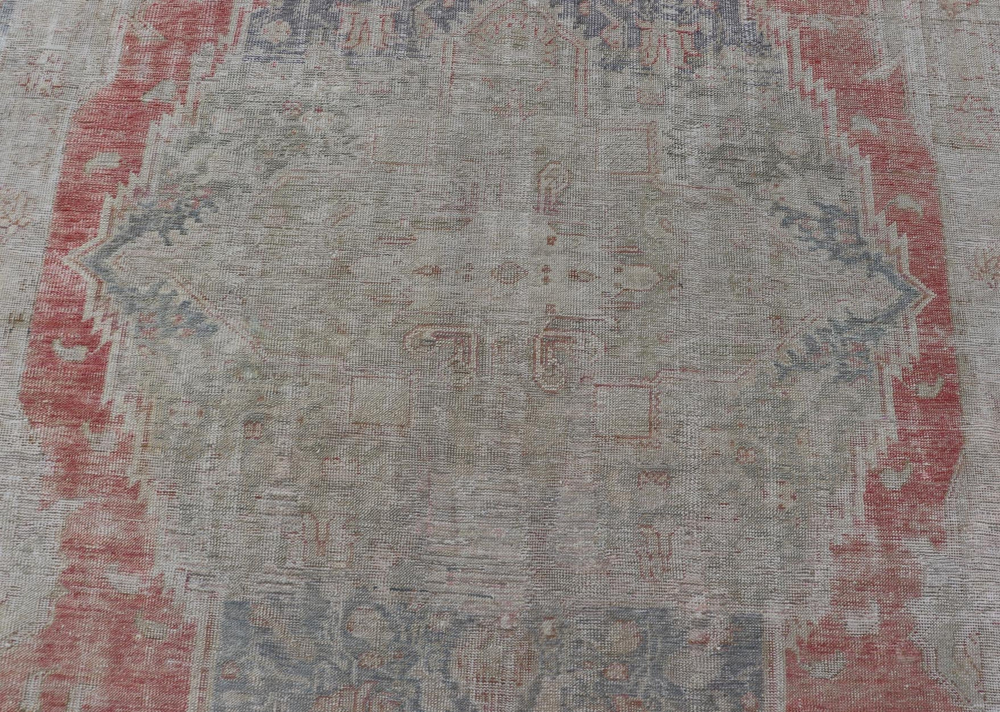 Measures: 9'7 x 13'7 Antique Hand Knotted Turkish Oushak with Large Medallion in Off White and Coral. Keivan Woven Arts / rug EN - 179974, country of origin / type: Turkey / Oushak, circa 1920 This large antique Turkish Oushak rug bears a off whit... - Keivan Woven ArtsEN - 179974 - 21949Rug