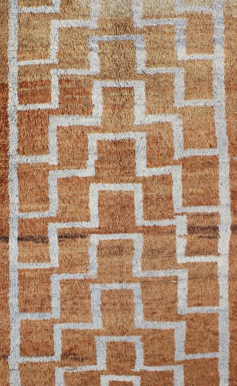 This vintage Tulu from mid - 20th century Turkey boasts an interconnected tribal pattern. The multi - tiered pattern consists of ivory outlines set on a light orange field. The contrast of color adds a particular depth to accentuate the unique style of thi... - Keivan Woven ArtsEN - 3313 - 5514Rug