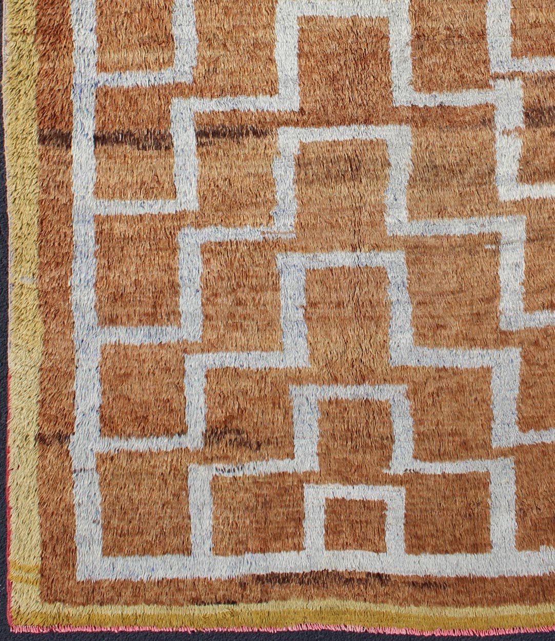 This vintage Tulu from mid - 20th century Turkey boasts an interconnected tribal pattern. The multi - tiered pattern consists of ivory outlines set on a light orange field. The contrast of color adds a particular depth to accentuate the unique style of thi... - Keivan Woven ArtsEN - 3313 - 5514Rug
