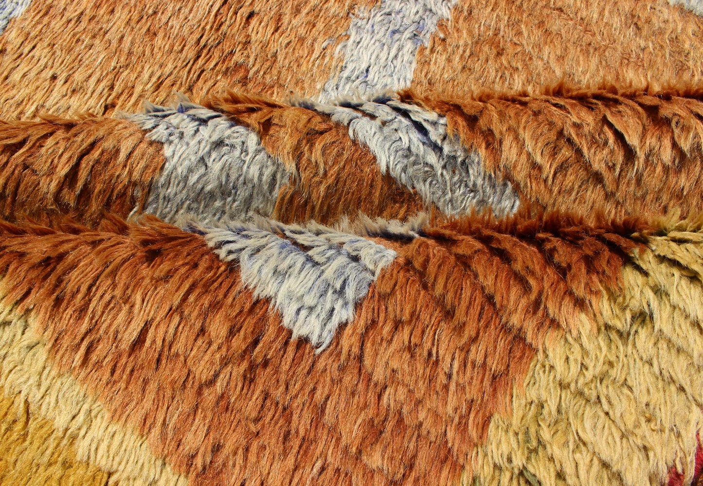 This vintage Tulu from mid - 20th century Turkey boasts an interconnected tribal pattern. The multi - tiered pattern consists of ivory outlines set on a light orange field. The contrast of color adds a particular depth to accentuate the unique style of thi... - Keivan Woven ArtsEN - 3313 - 5514Rug