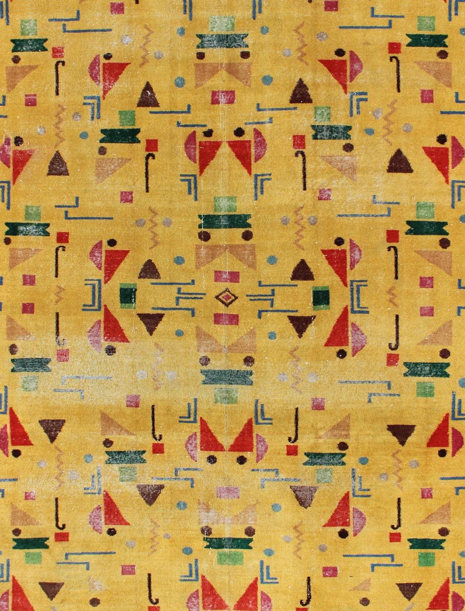 Mid - Century Modern Turkish Rug, Vintage Modern Design Carpet in Yellow Color. This finely composed Mid - Century Modern rug features a symmetric geometric design with various shapes, composed in vivid shades of yellow, red, green, blue and brown, ... - Keivan Woven ArtsEN - 627 - 4852Rug