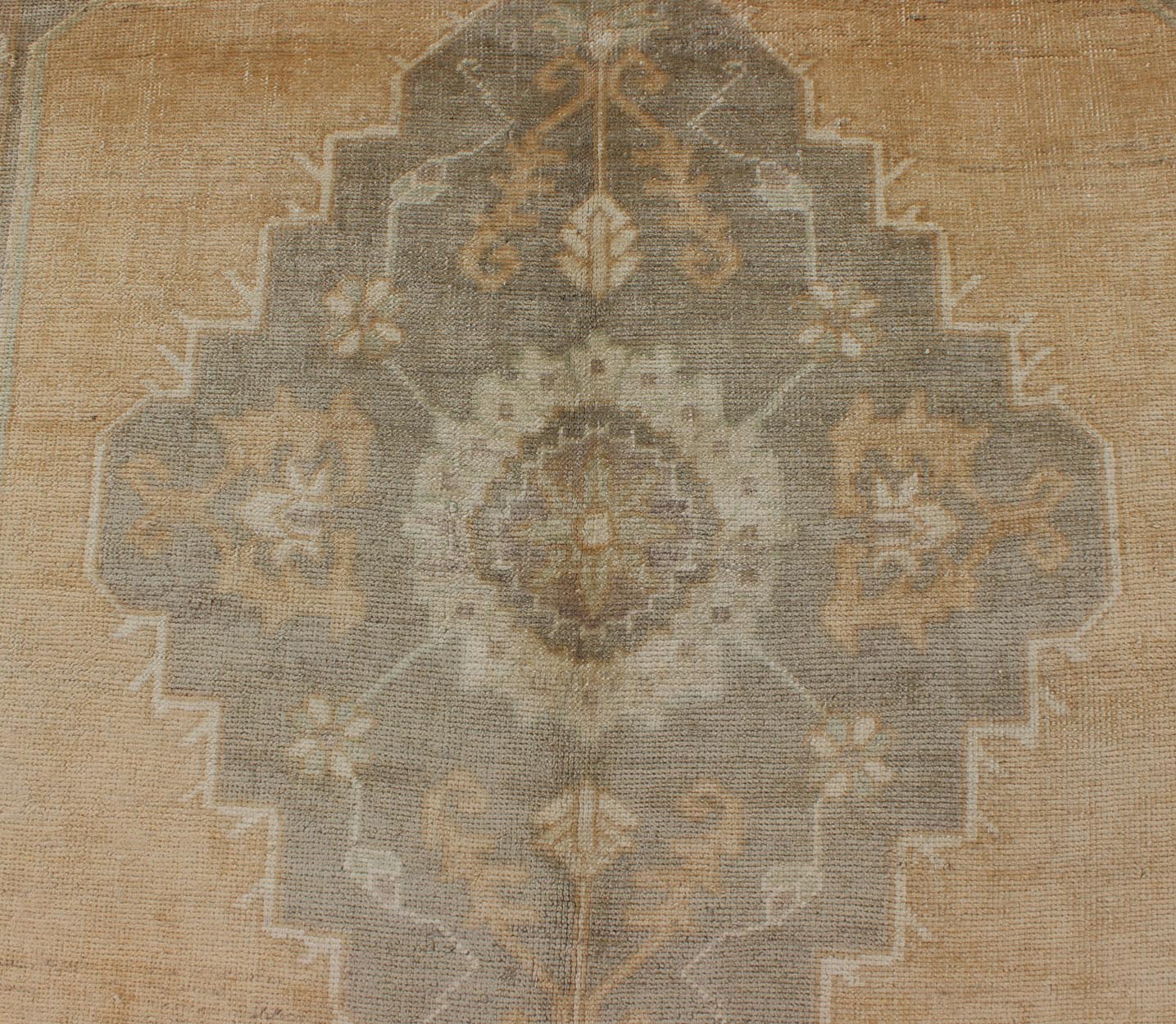Muted Mid - 20th Century Vintage Oushak Rug with Medallion in Camel Measures: 5'5 x 9'4 This muted Turkish Oushak rests beautifully on a grounded camel - colored field. An understated medallion is well - balanced by four organic corner motifs, ... - Keivan Woven ArtsEN - 721 - 9236Rug