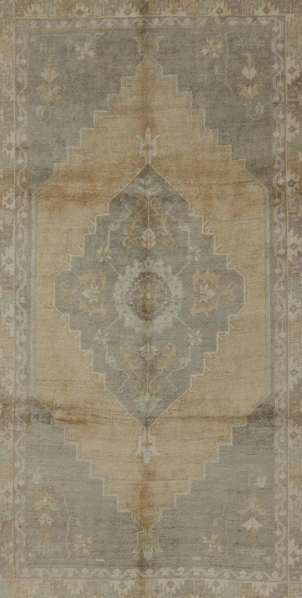 Muted Mid - 20th Century Vintage Oushak Rug with Medallion in Camel Measures: 5'5 x 9'4 This muted Turkish Oushak rests beautifully on a grounded camel - colored field. An understated medallion is well - balanced by four organic corner motifs, ... - Keivan Woven ArtsEN - 721 - 9236Rug